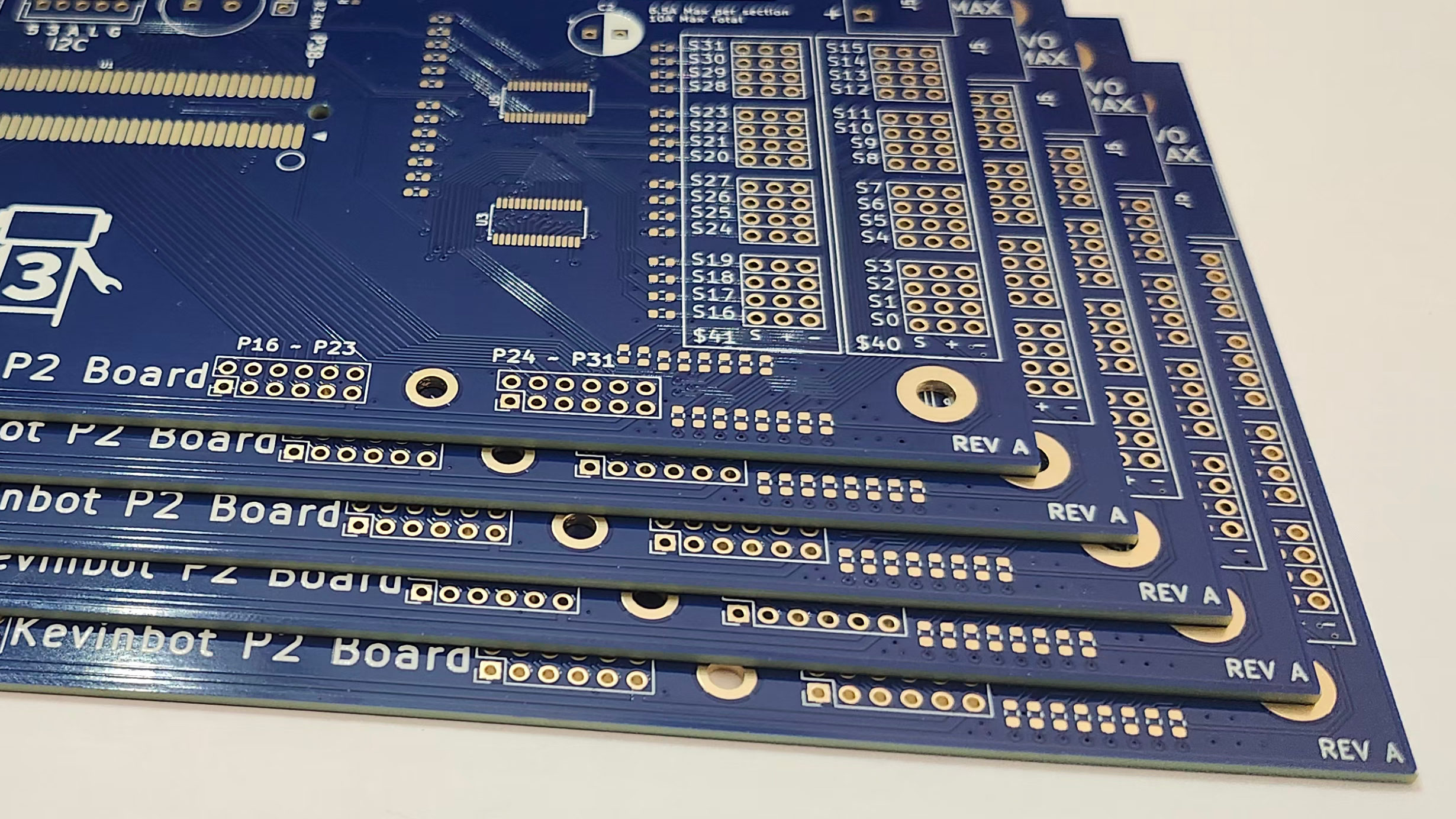 Image of blank, manufactured PCBs from PCBWay, blue; stacked