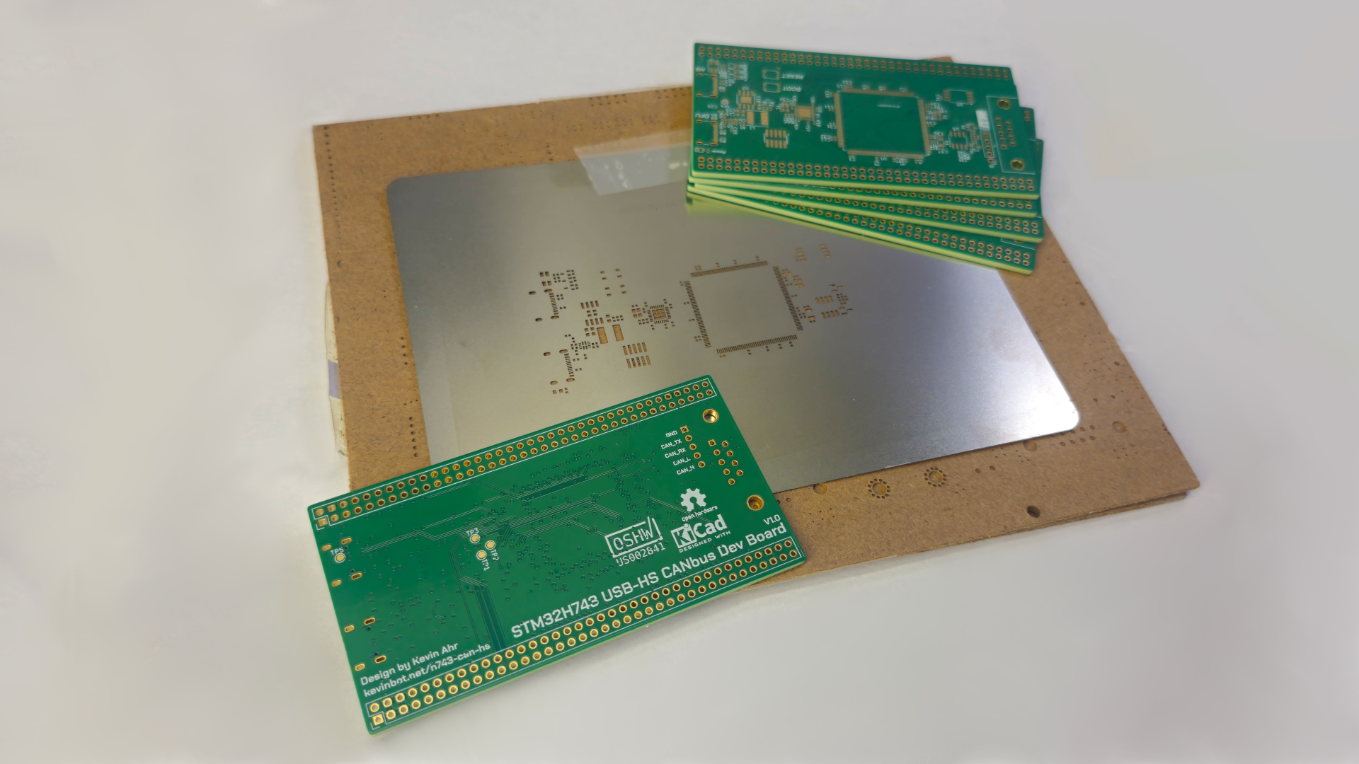 Image of PCBs and stencil on top of stencil packaging